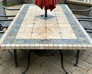 Patio Dining Set:  Stone and Slate 84" L x 44" W x 30" H Dining Table.  Treasure Garden Umbrella and Stand. 6 Frontage Outdoor Dining Chairs (2 Carlisle Woven Swivel Rockers + 4 Carlisle Woven Dining Chairs). Current Retail is $1699.00 a Pair