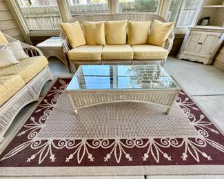 Sunroom Suite includes: 3 Cushion Wicker Sofa, 2 Cushion Wicker Loveseat, Glass and Wicker Coffee Table and Glass and Wicker Side Table.