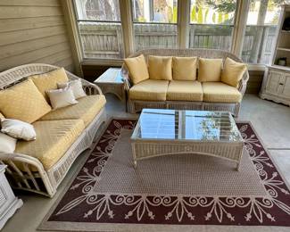 Sunroom Suite includes: 3 Cushion Wicker Sofa, 2 Cushion Wicker Loveseat, Glass and Wicker Coffee Table and Glass and Wicker Side Table.