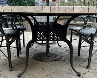 Patio Dining Set:  Stone and Slate 84" L x 44" W x 30" H Dining Table.  Treasure Garden Umbrella and Stand. 6 Frontage Outdoor Dining Chairs (2 Carlisle Woven Swivel Rockers + 4 Carlisle Woven Dining Chairs). Current Retail is $1699.00 a Pair