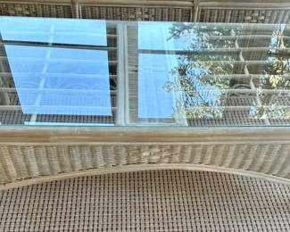 Sunroom Suite includes: 3 Cushion Wicker Sofa, 2 Cushion Wicker Loveseat, Glass and Wicker Coffee Table and Glass and Wicker Side Table.