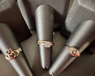 14k yellow gold vintage rings from left to right: Traditional Irish Claddaugh Ring made in Ireland, vintage milgrain diamond set with matching band, gold and diamond fashion ring