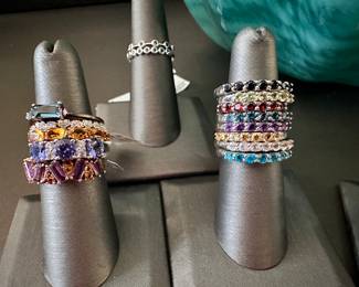 Stack bands galore! These are all sterling silver and semi-precious gemstones with the exception of the sapphire bezel rings in the middle. Great way to jazz up existing rings as guards or build your own fun stack.