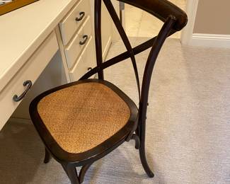 #67 - $70 On of four X back wood black chair - cane seat. 