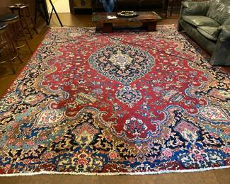 #76 - $1200 - Red & Blue Rug. 13' 2"W x 9' 11"L