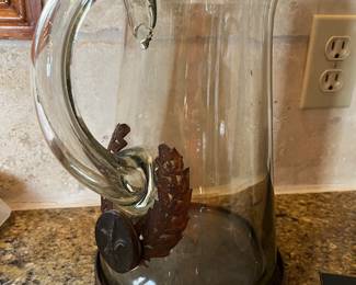 $100 Jan barboglio Fleur de Lys large water picher with sweat copper base. 