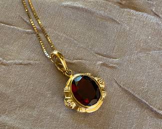 #C - $350 14kt and garnet pendant 