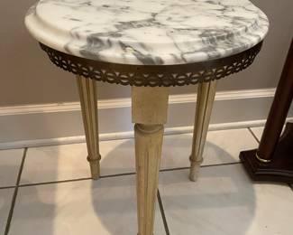#38 - $70 - Round marble top side table 14 W, 17H (three legged)