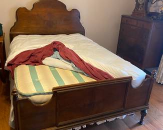 $750.00 full size bed, with box springs, mattress, head and foot board, chest of drawers 36x20x44 walnut. Dressing table with mirror and bench 46x18x32