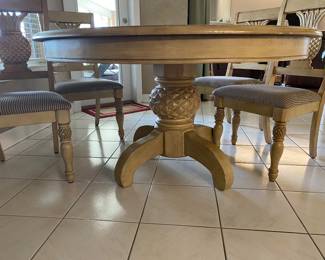 $395.00 kitchen table with 4 pineapple back chairs 65w 48 d 30 h with leaf 98 W without leaf