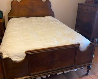 $750.00 full size bed, with box springs, mattress, head and foot board, chest of drawers 36x20x44 walnut. Dressing table with mirror and bench 46x18x32