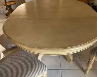 $395.00 kitchen table with 4 pineapple back chairs 65w 48 d 30 h with leaf 98 W without leaf