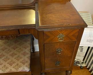 $750.00 full size bed, with box springs, mattress, head and foot board, chest of drawers 36x20x44 walnut. Dressing table with mirror and bench 46x18x32