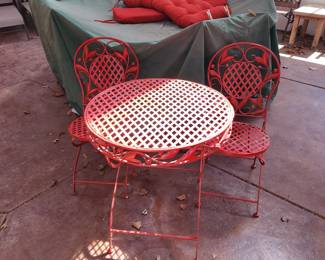 Red table with 2 chairs