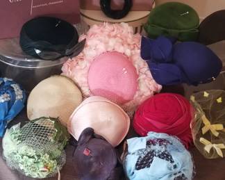 Just a partial glimpse at this fine, well kept collection of ladies hats.