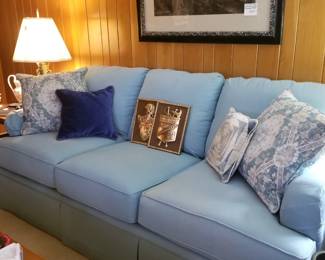 Great Bassett neutral blue, three cushioned sofa. Like new, gently used.