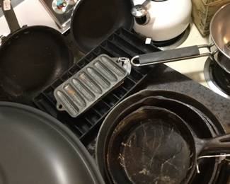 Several cast iron cookware 