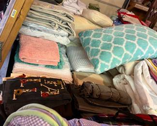 So much beddding, rugs, linens