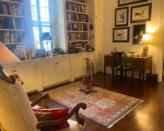 One of many oriental rugs, wonderful antique English rocking horse, great library, Asian influenced writing desk, suite of Picasso lithographs (sold individually) 