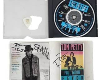 Tom Petty Signed CD Insert w/ Mike Campbell Pick