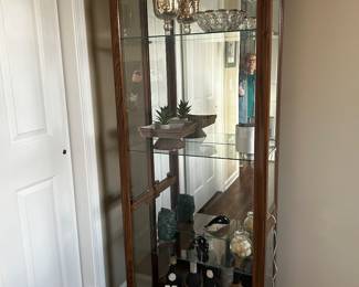 Glass cabinet With mirror on the inside, $60