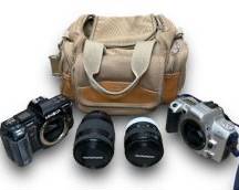 Minolta Maxxum STsi 35mm Panorama Date SLR Camera w/ A Quantaray 4-5.6 F: 70-210mm Lens And A Minolta Maxxum 7000 35mm AF SLR Film Camera w / A Quantaray-MX AF f3.5-4.5 35-70mm Multi-Coated Lens
