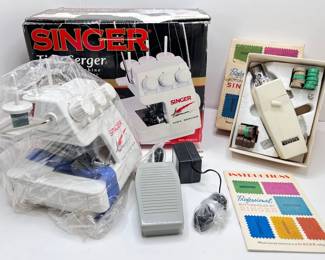 New Singer Tiny Serger & Singer Buttonhole Maker In Original Boxes
Lot #: 110