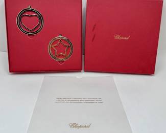 2 New Chopard Boxed Christmas Ornaments, Star & Heart
Lot #: 100