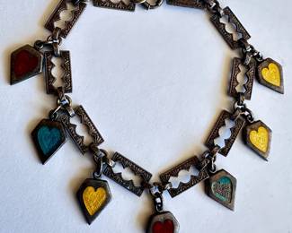 Vintage Sterling Silver Charm Bracelet With 7 Enameled Sterling Memory Hearts
Lot #: 42