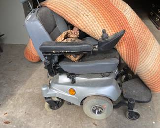 Power chair and rug romance.