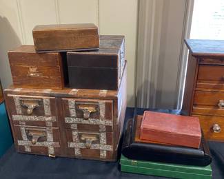 Many fine wooden boxes of varying sizes.