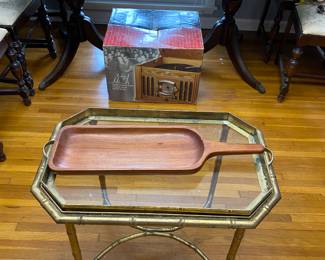 Brass and glass table with hand carved bread dish.