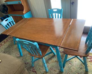 This table has got more extensions than Binta Braiding on 20th Street.