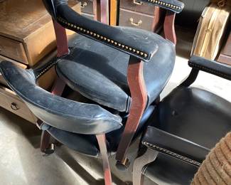 Cool black office chairs in bad lighting.