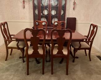 #1  American Drew Table with 2 leaves (leaves in as in condition) with 6 chairs (chair seats fabric as is - easily recovered)  65-93x41x29  $275.00    #2  Cabinet American Drew China Cabinet with 2 glass front doors, 2 glass shelves, 1 wood shelf with back plate rack, 3 wood drawers & 2 wood doors with bottom shelf - lighted   52Hx16Dx78.5T  $275.00 