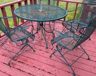 #39  Green Wrought Iron Table with 4 bouncy chairs - 42"Round with umbrella	 $200.00 
