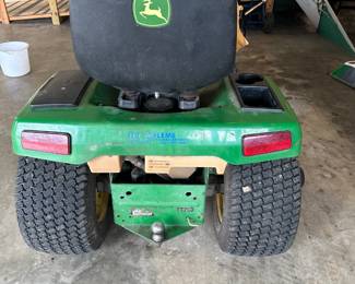 #35  John Deere GS345 Riding Mower, missing top, seat cracked but runs great  $1,200.00 
