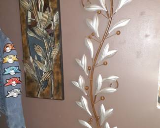 Wall Art, Metal. One on Left has a mirror background