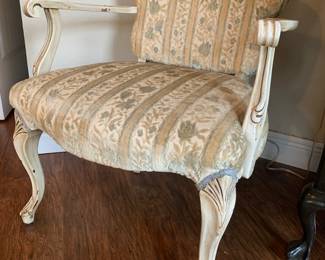 Carved French arm chair