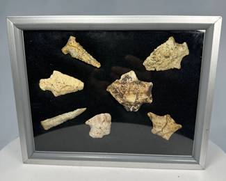 Framed Arrowheads on Black Background