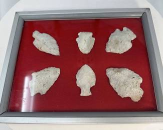 Framed All White Arrowheads on Red Background