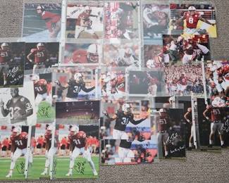 LOT OF 30 SIGNED NEBRASKA HUSKER 8X10 PHOTOS .