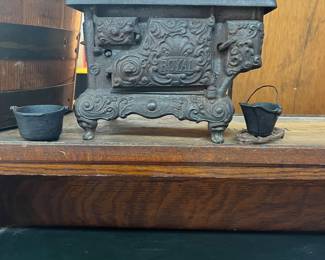 Cast iron miniature stove ( stove caps missing )