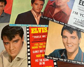 Elvis 45 records w sleeves 