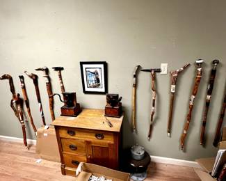 Handcrafted walking sticks. Unique craftworks commemorative of visiting different towns, and made with materials from those towns.