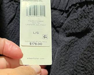 Tons of new clothes with tags still on!