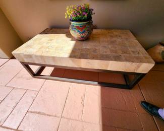 Outdoor table, colorful Mexican pottery throughout.