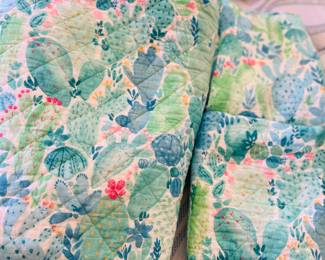 Cute bedding! Love this cheery cactus print
King matelassé coverlet and pair of shams $35!