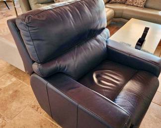 We have a PAIR of these navy blue leather swivel recliners. They are in pristine condition.