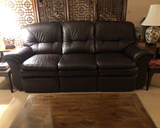 Leather Lazyboy Sofa with two reclining end seats. ( L: 86in | D: 38in | H: 40in )